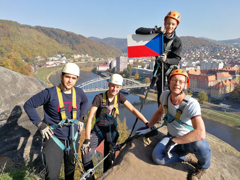 A group of climbers near the flag